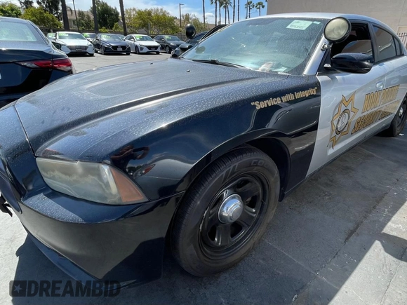 2012 Dodge Charger Police with VIN 2C3CDXAG0CH295515, listed as a Copart auction lot 51870315 with 128,837 mi miles and Clean Title. Bid and sale history available at carsss.com. Image 2.