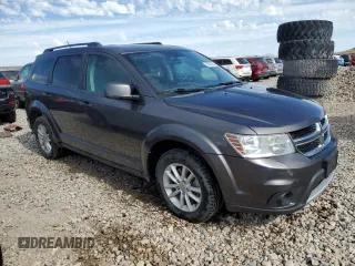 2015 Dodge Journey SXT with VIN 3C4PDDBG2FT684520, listed as a Copart auction lot 58835535 with 101,763 mi miles and Salvage title. Bid and sale history available at DreamBid. Image 4.