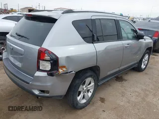2016 Jeep Compass Sport with VIN 1C4NJDBB8GD780146, listed as a IAAI auction lot 41792416 with 127,548 mi miles. Bid and sale history available at carsss.com. Image 4.