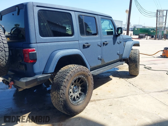 2022 Jeep Wrangler Unlimited Sahara with VIN 1C4HJXEN1NW262546, listed as a IAAI auction lot 41975925 with 17,994 mi miles and . Bid and sale history available at DreamBid. Image 4.