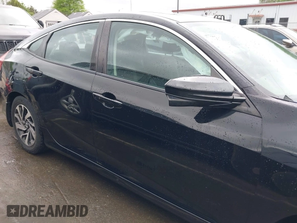 2016 Honda Civic EX with VIN 19XFC2F79GE023053, listed as a IAAI auction lot 41961571 with 136,054 mi miles and . Bid and sale history available at DreamBid. Image 14.