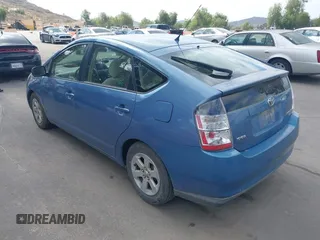 2005 Toyota Prius with VIN JTDKB20U957040822, listed as a IAAI auction lot 42129542 with 214,455 mi miles. Bid and sale history available at carsss.com. Image 3.