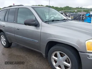 2008 GMC Envoy SLE2 with VIN 1GKDT13S482244279, listed as a IAAI auction lot 42144735 with 221,682 mi miles. Bid and sale history available at carsss.com. Image 13.