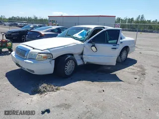 2007 Mercury Grand Marquis LS with VIN 2MEFM75VX7X623356, listed as a IAAI auction lot 41783361 with 157,921 mi miles. Bid and sale history available at carsss.com. Image 18.