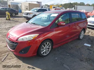 2013 Mazda Mazda5 Grand Touring with VIN JM1CW2DL1D0160213, listed as a IAAI auction lot 40787273 with 130,589 mi miles. Bid and sale history available at carsss.com. Image 2.