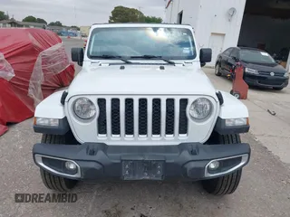 2023 Jeep Gladiator Overland z VIN 1C6HJTFG7PL566484, wystawiony jako IAAI lot #42424428 z przebiegiem 52 057 mil mil oraz . Historia ofert i sprzedaży dostępna na DreamBid. Obrazek 12.