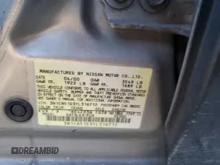 2000 Nissan Sentra XE with VIN 3N1CB51D3YL316712, listed as a Copart auction lot 84512254 with 228,070 mi miles and Salvage title. Bid and sale history available at DreamBid. Image 12.