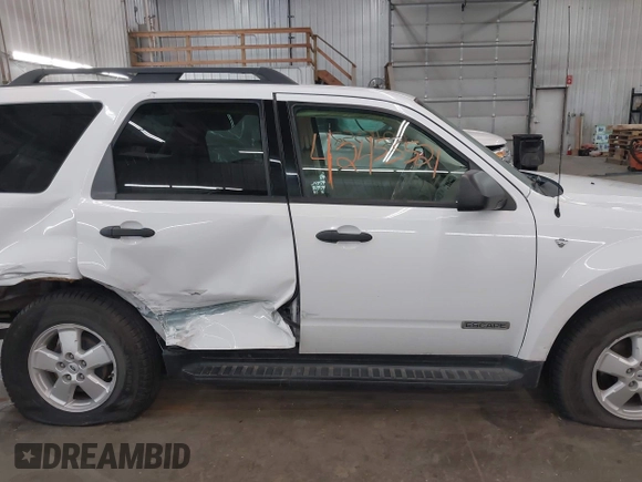 2008 Ford Escape XLT z VIN 1FMCU93108KB04610, wystawiony jako IAAI lot #42453521 z przebiegiem 186 306 mil mil oraz . Historia ofert i sprzedaży dostępna na DreamBid. Obrazek 13.
