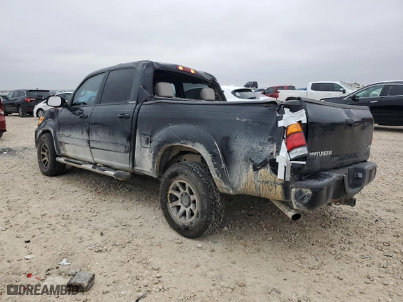 2004 Toyota Tundra Ltd with VIN 5TBET38124S438140, listed as a Copart auction lot 84105494 with 301,645 mi miles and Salvage Title. Bid and sale history available at carsss.com. Image 2.