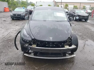 2022 Tesla Model Y Performance z VIN 7SAYGDEF7NF457757, wystawiony jako IAAI lot #42263449 z przebiegiem 65 747 mil mil oraz . Historia ofert i sprzedaży dostępna na DreamBid. Obrazek 13.