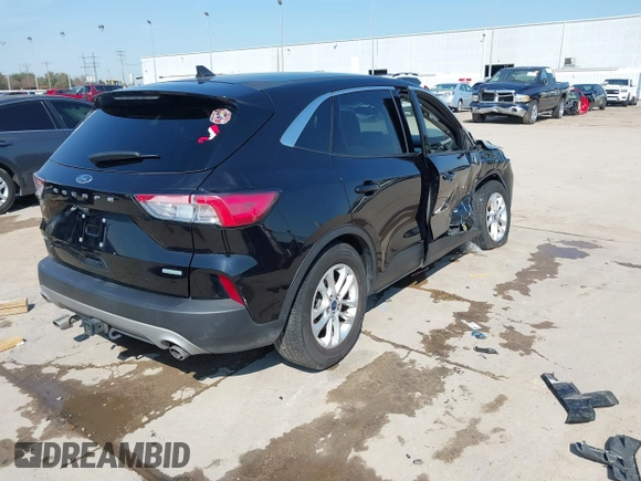 2020 Ford Escape SE with VIN 1FMCU0G61LUB77189, listed as a IAAI auction lot 41688121 with 101,407 mi miles and . Bid and sale history available at DreamBid. Image 4.
