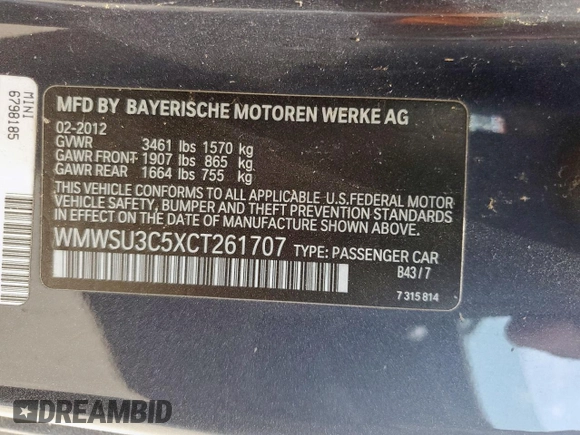 2012 MINI Hardtop z VIN WMWSU3C5XCT261707, wystawiony jako Copart lot #59939565 z przebiegiem 52 509 mil mil oraz Szkoda całkowita • Salvage title. Historia ofert i sprzedaży dostępna na DreamBid. Obrazek 13.