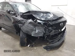 2024 Mazda CX-30 2.5 S with VIN 3MVDMBAM0RM721141, listed as a IAAI auction lot 40984709 with 870 mi miles. Bid and sale history available at carsss.com. Image 6.