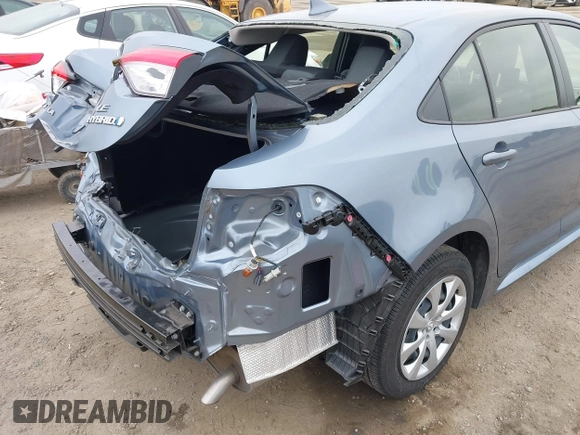 2023 Toyota Corolla Hybrid LE with VIN JTDBCMFE8PJ013271, listed as a IAAI auction lot 42099797 with 14,080 mi miles and . Bid and sale history available at carsss.com. Image 19.