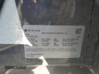2022 Rivian R1S Launch Edition with VIN 7PDSGABL1NN000514, listed as a Copart auction lot 77444184 with 29,490 mi miles and Salvage Title. Bid and sale history available at DreamBid. Image 12.