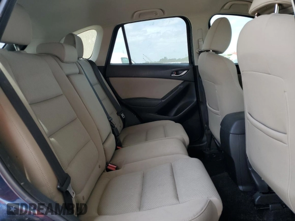 2016 Mazda CX-5 Touring with VIN JM3KE2CY9G0834048, listed as a Copart auction lot 54491535 with 116,328 mi miles and Salvage Title. Bid and sale history available at DreamBid. Image 11.