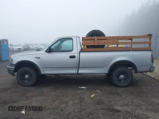 1999 Ford F-150 with VIN 2FTZF1828XCA85643, listed as a IAAI auction lot 41347113 with 173,813 mi miles and . Bid and sale history available at DreamBid. Image 14.