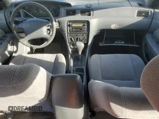 2000 Toyota Camry CE with VIN JT2BG22K0Y0470743, listed as a Copart auction lot 51980385 with 300,464 mi miles and Salvage Title. Bid and sale history available at carsss.com. Image 8.