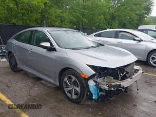 2020 Honda Civic LX with VIN 2HGFC2F64LH516064, listed as a IAAI auction lot 42206250 with 42,207 mi miles and . Bid and sale history available at DreamBid. Image 1.