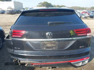 2021 Volkswagen Atlas SE z VIN 1V2RE2CA8MC201494, wystawiony jako IAAI lot #41498075 z przebiegiem 67 687 mil mil oraz . Historia ofert i sprzedaży dostępna na DreamBid. Obrazek 15.