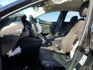 2024 Mazda 3 S with VIN 3MZBPAAM3RM423321, listed as a Copart auction lot 88738705 with 6,889 mi miles and Salvage Title. Bid and sale history available at DreamBid. Image 7.