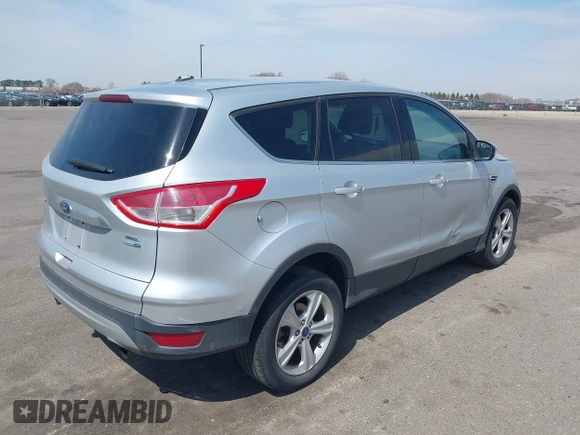 2013 Ford Escape SEL with VIN 1FMCU9H99DUA74813, listed as a IAAI auction lot 42070945 with 187,417 mi miles and . Bid and sale history available at DreamBid. Image 4.