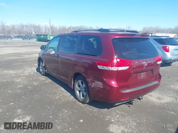 2012 Toyota Sienna LE AAS with VIN 5TDKK3DCXCS244605, listed as a IAAI auction lot 41516400 with 186,198 mi miles. Bid and sale history available at carsss.com. Image 3.