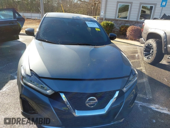 2020 Nissan Maxima S with VIN 1N4AA6BV7LC381254, listed as a IAAI auction lot 41246789 with 73,562 mi miles and . Bid and sale history available at DreamBid. Image 12.