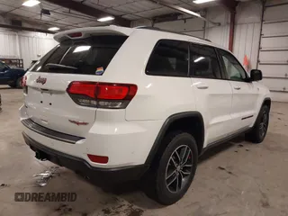 2017 Jeep Grand Cherokee Trailhawk with VIN 1C4RJFLG7HC712208, listed as a IAAI auction lot 42174543 with 158,518 mi miles and . Bid and sale history available at DreamBid. Image 4.