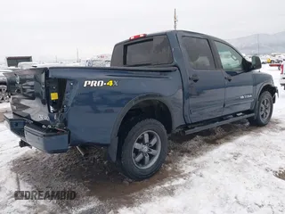 2015 Nissan Titan SV z VIN 1N6AA0ECXFN507260, wystawiony jako IAAI lot #41203612 z przebiegiem 103 000 mil mil oraz . Historia ofert i sprzedaży dostępna na DreamBid. Obrazek 4.