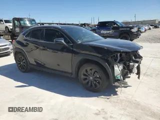 2022 Lexus UX with VIN JTHX3JBH9N2052462, listed as a Copart auction lot 47924875 with 69,696 mi miles and Salvage Title. Bid and sale history available at carsss.com. Image 4.