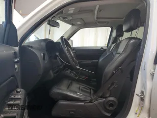 2013 Jeep Patriot Limited z VIN 1C4NJRCB5DD222830, wystawiony jako Copart lot #53867265 z przebiegiem 214 152 mil mil oraz Szkoda całkowita • Salvage title. Historia ofert i sprzedaży dostępna na DreamBid. Obrazek 7.