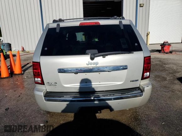 2010 Jeep Grand Cherokee Limited z VIN 1J4RR5GT4AC145692, wystawiony jako Copart lot #75649614 z przebiegiem 99 362 mil mil oraz Szkoda całkowita • Salvage title. Historia ofert i sprzedaży dostępna na DreamBid. Obrazek 6.