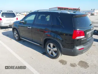 2013 Kia Sorento EX with VIN 5XYKU4A27DG326480, listed as a IAAI auction lot 42207960 with 165,377 mi miles and . Bid and sale history available at carsss.com. Image 3.