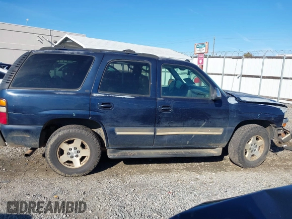 2005 Chevrolet Tahoe LT z VIN 1GNEC13T85J201856, wystawiony jako IAAI lot #41099372 z przebiegiem 303 169 mil mil oraz . Historia ofert i sprzedaży dostępna na DreamBid. Obrazek 13.