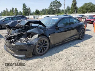 2021 Tesla Model S Plaid with VIN 5YJSA1E66MF434066, listed as a Copart auction lot 61648755 with Not provided miles and Salvage title. Bid and sale history available at DreamBid. Image 1.