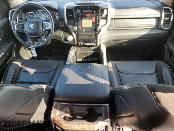 2019 Ram 1500 Laramie with VIN 1C6SRFDTXKN674871, listed as a Copart auction lot 77143314 with 30,418 mi miles and Salvage Title. Bid and sale history available at carsss.com. Image 8.