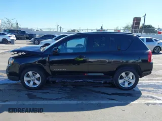 2016 Jeep Compass Latitude with VIN 1C4NJCEB2GD628384, listed as a IAAI auction lot 41752694 with 122,589 mi miles. Bid and sale history available at carsss.com. Image 14.