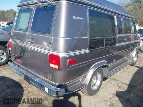 1993 GMC Vandura z VIN 1GDEG25KXPF515274, wystawiony jako IAAI lot #41663966 z przebiegiem 112 288 mil mil oraz . Historia ofert i sprzedaży dostępna na DreamBid. Obrazek 4.