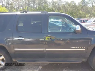 2011 Chevrolet Suburban LTZ with VIN 1GNSKKE31BR299912, listed as a IAAI auction lot 41990351 with 268,982 mi miles. Bid and sale history available at carsss.com. Image 13.
