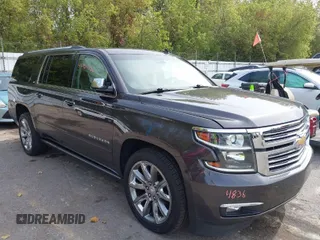 2015 Chevrolet Suburban LTZ with VIN 1GNSKKKC6FR243250, listed as a IAAI auction lot 40464836 with 120,030 mi miles. Bid and sale history available at carsss.com. Image 1.