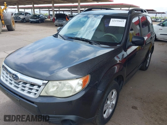 2012 Subaru Forester X with VIN JF2SHBBC2CH435307, listed as a IAAI auction lot 42195023 with 169,964 mi miles and . Bid and sale history available at DreamBid. Image 6.