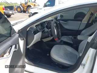 2014 Tesla Model S 60 with VIN 5YJSA1H1XEFP40611, listed as a IAAI auction lot 42826752 with Not provided miles and . Bid and sale history available at DreamBid. Image 5.