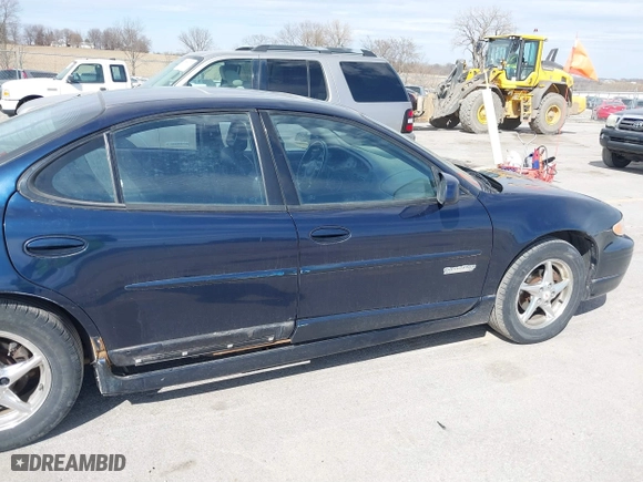 2003 Pontiac Grand Prix GT with VIN 1G2WP52K53F148801, listed as a IAAI auction lot 41888412 with 135,142 mi miles. Bid and sale history available at carsss.com. Image 14.