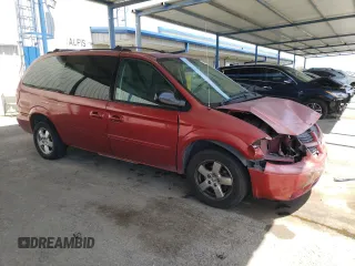 2005 Dodge Caravan SXT with VIN 2D4GP44L65R120861, listed as a Copart auction lot 57040565 with 244,971 mi miles and Salvage title. Bid and sale history available at DreamBid. Image 4.