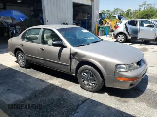 1998 Nissan Maxima GXE с VIN JN1CA21D0WT525657, выставлен на аукционе Copart как лот 57055485 с пробегом Не указан миль и Списание • Salvage title. История ставок и продаж доступна на DreamBid. Изображение 4.