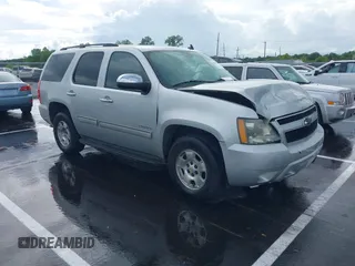 2010 Chevrolet Tahoe LS with VIN 1GNUCAE03AR117826, listed as a IAAI auction lot 42241571 with 201,075 mi miles and . Bid and sale history available at DreamBid. Image 1.