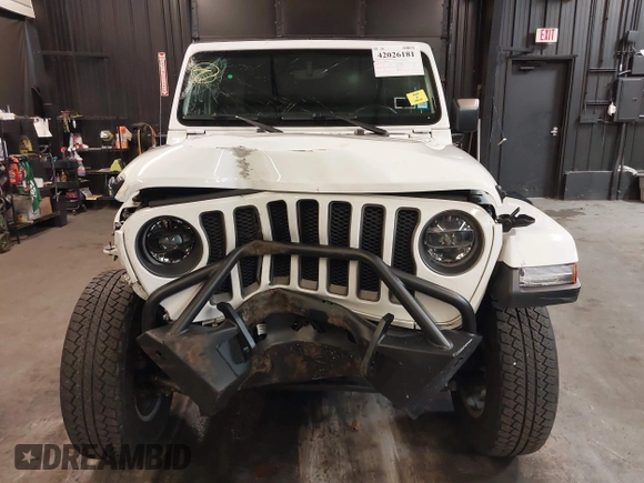 2021 Jeep Wrangler Unlimited Freedom with VIN 1C4HJXDNXMW681267, listed as a IAAI auction lot 42026181 with 40,143 mi miles and . Bid and sale history available at DreamBid. Image 12.