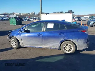 2016 Toyota Prius Four z VIN JTDKARFU1G3519894, wystawiony jako IAAI lot #41430417 z przebiegiem 131 693 mil mil oraz . Historia ofert i sprzedaży dostępna na DreamBid. Obrazek 14.
