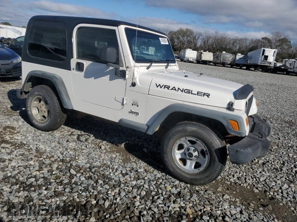 2006 Jeep Wrangler Sport Right Hand Drive with VIN 1J4F449S26P741397, listed as a Copart auction lot 41656585 with 205,683 mi miles and Clean Title. Bid and sale history available at carsss.com. Image 4.